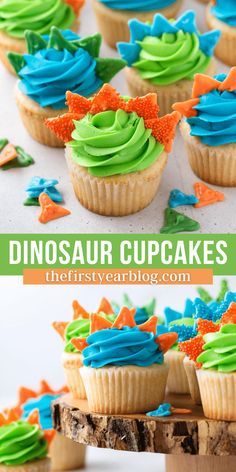 dinosaur cupcakes with green, blue and orange frosting on a cake stand