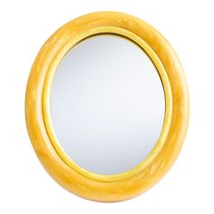 a round mirror with yellow paint on it's sides and an oval frame in the middle