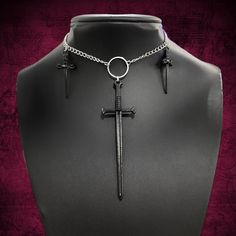 Black Sword Dagger Choker
.
Silver Chain Choker. 
Long Black Sword Pendant w/ 2 Dagger Charms.

 *Lobster Clasp. 
 *Extender Chain. 

CB159 

#Choker #Necklace #gothicjewelry #punkjewelry #goth men women unisex Goth Men, Choker Silver, Punk Jewelry, Gothic Jewelry, Chain Choker, Women's Jewelry, Lobster Clasp, Silver Chain, Choker