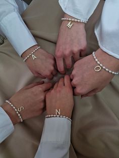 Looking for a special gift for bridesmaid for bachelorette party or wedding day? This dainty pearl bracelet is the epitome of refined elegance. Present her with a personalized token of your love, creating a connection that transcends the wedding day and becomes a cherished memory for years to come.  This personalized pearl bracelet features a beautiful golden-plated letter initial letter charm, adorned with sparkling cubic zirconia stones, that perfectly complements its elegant design.  makes it Elegant Beaded Bracelets With Letter Beads For Gift, Elegant Beaded Bracelets With Letter Beads As Gift, Elegant Pearl Jewelry With Letter Beads, Elegant Bridesmaid Bracelets, Elegant Pearl Bracelet With Letter Beads, Elegant Beaded Bracelets With Letter Beads For Mother's Day, Elegant Pearl Beaded Bracelets With Letter Beads, Elegant Mother's Day Beaded Bracelets With Letter Beads, White Beaded Bracelets For Bridesmaid Gift