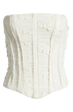 Lovely lace and floral embroidery enhance the charm of this sultry strapless corset top. 100% cotton with cotton/nylon contrast Dry clean Imported Bridal Corset Top, Strapless Corset Top, Wedding Corset, White Corset Top, Bridal Corset, Fall Wardrobe Essentials, Bridal Elegance, White Corset, Strapless Corset