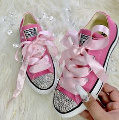 Bling Pink Converse Swarovski Crystal All Star Low Top Women's Bling Diamond Sneakers With Ribbon Satin Pink Laces  CONVERSE CHUCK TAYLOR ALL STAR LOW TOP- Encrusted With Swarovski Crystals- Women's Bling Red Sneakers  May substitute shoe color or crystals color. Many of our styles are also available in kids sizes as well as all genders. Check our other listings for more options. Custom orders are accepted!  Design: All our products are handmade by a certify Swarovski artist using authentic Swar Pink Embellished Low-top Sneakers, Pink Low-top Bling Sneakers, Pink Bling Low-top Sneakers, Pink Bedazzled Low-top Sneakers, Diamond Sneakers, Bling Sneakers, Converse Star, White Kicks, Custom Bling