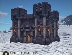 an image of a castle made out of blocks in the snow with text that reads blackstone fortresss