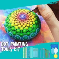 a person is painting a colorful object with acrylic paint