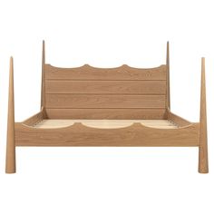 a wooden bed frame with four posts on the headboard and foot board, made from wood