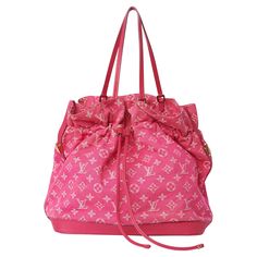 Vintage 2000’s Louis Vuitton pink denim Noeful bucket bag. Feature the iconic LV monogram pink canvas, pink leather straps, additional longer strap to wear crossbody, inner back zip pocket, drawstring closure. In excellent condition. Brand: Louis Vuitton Color: Pink Brand: Louis Vuitton Fabric: Cotton / Leather Dustbag: Yes Serial Number: TJ2103 Authenticity guaranteed Measurements when laid flat: Length: 15.5 inches, Width: 8 inches, Height: 12.5 inches Louis Vuitton Rosa, Ruffles Bag, Louis Vuitton Store, Hermes Kelly Bag, Louis Vuitton Vintage, Louis Vuitton Pink, Chanel Flap Bag, Classic Flap Bag, Pink Denim