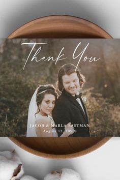 a wedding thank card with the words, thank you and an image of a bride and groom