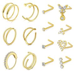 various types of earrings and piercings on a white background