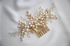 Stunning hair comb decorated with zircon stones, crystal and pearl beads. All parts was carefully combined to each other for making the best hair accessory for your special day. DETAILS - Put headpiece after using hair spray - Do not use any washing liquids and chemicals - Please keep your hair accessory in dry please away from direct sunlight - Tarnish resident jewelry wire - Designed and made in New York, USA - Flexible and easy to use - Every headpiece will be packaged in gift box If you have Ivory Gold Wedding, Gold Ivory Wedding, Pearl Bridal Hair Comb, Pearl Hair Accessories, Ivory Wedding Flowers, Pearl Bridal Hair, Glass Painting Patterns, Bridal Hair Combs Pearl, Floral Hair Pins