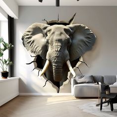 an elephant's head breaking through the wall in a living room with white walls