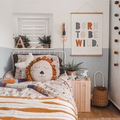 a child's bedroom with a lion bedding set