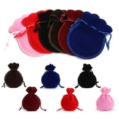 six small velvet pouchs with draws on each side and four different colors in the middle