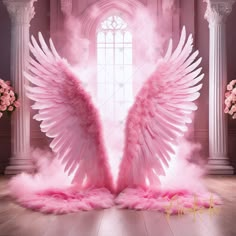 two pink angel wings in front of a window with roses on the floor and columns