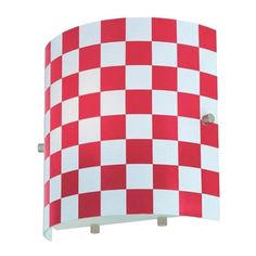 a red and white checkered lamp shade hanging from a ceiling fixture on a wall