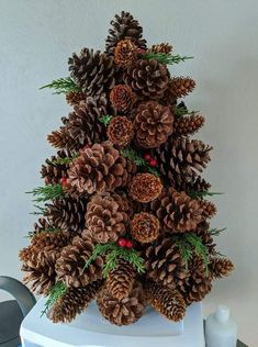 a christmas tree made out of pine cones