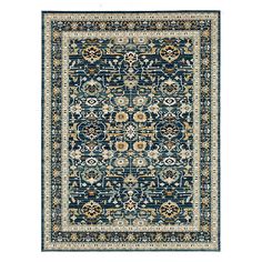 a blue and beige rug with an ornate design on the bottom, in front of a white background