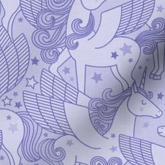 a purple and white unicorn pattern on fabric