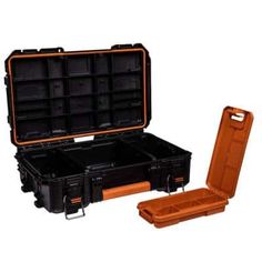 an orange and black case is open to show the contents