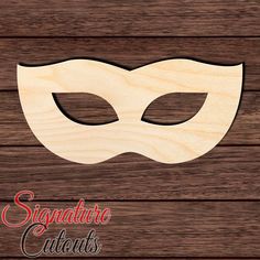 a wooden mask with the word signature customs on it's front and back side