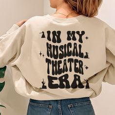 The perfect Sweatshirt for actors, actresses, and theater lovers! A matching Christmas gift for theater students, theater teachers, and obviously musical theater lovers. → How to place an order Select the shirt color and size and click Add to Cart. For multiple items, return to the listing and repeat the steps. → Care instructions Machine wash cold, inside out, with like colors. Only non-chlorine bleach. Tumble dry low. Medium iron. Do not iron decoration. Double-needle stitched neckline, bottom Company Merch, Theatre Shirts, Musical Theater, Iron Decoration, Theatre Company, Christmas 2024, Musical Theatre, Shirt And Pants, School Stuff