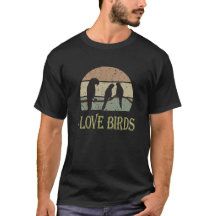 a man wearing a black t - shirt with the words love birds printed on it