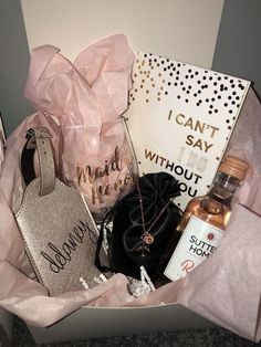 a gift box with liquor and other items