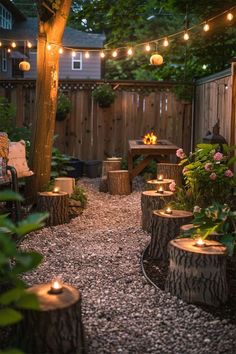 an outdoor patio with lights strung from the trees