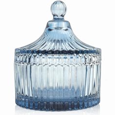 a blue glass jar with a lid