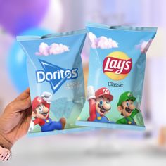 two bags of lays potato chips in front of a blurry image of mario and luigi