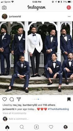 several men in tuxedos are posing for a photo on the steps with each other