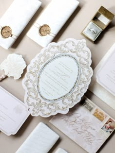 the wedding stationery is laid out neatly