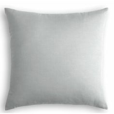 a light gray pillow on a white background