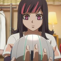 an anime character holding a ball in her hands