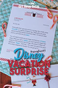 the disney vacation surprise letter is on display with candy canes and candy canes