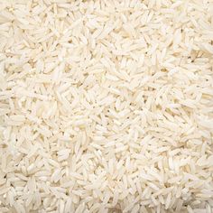 white rice is piled high in the air