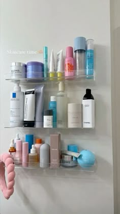 a bathroom shelf filled with lots of beauty products