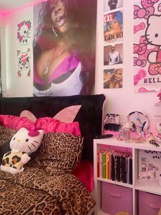 a bedroom decorated in pink and leopard print