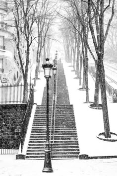 black and white photograph of snow covered steps