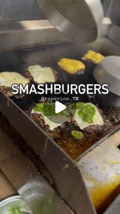 food is being cooked in a fryer on the grill with words that read smashburgers