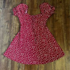 Cute Flowy Heart Shape Dress Tie At The Front Never Worn! No Tag Casual Red A-line Mini Dress, Red Casual Mini Sundress, Casual Red Mini Sundress, Red Sweetheart Neckline Dress For Beach, Red Sweetheart Neckline Beach Dress, Red Sweetheart Neckline Dress For The Beach, Casual Red Mini Dress With Square Neck, Casual V-neck Dress With Heart Print, Summer Heart Print Mini Dress