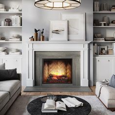 a living room filled with furniture and a fire place in the middle of a room