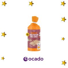 a bottle of orange juice with stars around it