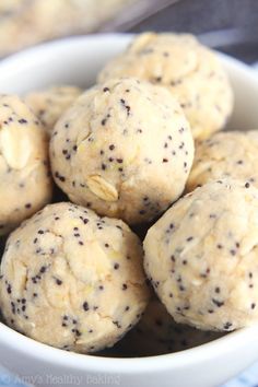 a white bowl filled with cookies on top of a table