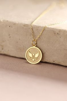 Gold Eagle Pendant - Eagle Gold Necklace ● Material of pendant: Solid Gold 14k ( REAL GOLD ) ● Metal Stamp: 14k ( REAL GOLD ) ● The pendant is available in 5 sizes: - 12,7 mm / 0.5 inches (Diameter) - 14,0 mm / 0,55 inches ( Diameter ) In the photos - 15,3 mm / 0.6 inches ( Diameter ) - 16,5 mm / 0,65 inches ( Diameter ) - 19,1 mm / 0,75 inches ( Diameter ) ( In the photos the size is 14mm / 0.55 inches Diameter ) ( Jump Ring inner diameter: 4 mm ) ● Material of chain: Solid gold 14k ( REAL GOLD Symbolic Charms Necklaces For Commemoration, Symbolic Charms Necklace For Commemoration, Tarnish Resistant Pendant Charm Necklace For Anniversary, Commemoration Pendant Necklaces With Charms, Commemorative Pendant Necklaces With Charms, Commemoration Charms Necklace With Round Pendant, Commemorative Pendant Necklace With Charms, Gold Charm Necklaces For Commemoration, Yellow Gold Jewelry With Charms For Birthday Gift