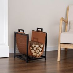 a chair and firewood rack in a living room