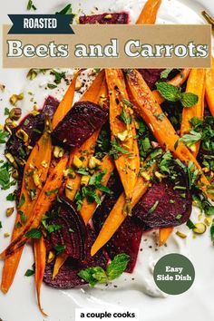 These roasted beets and carrots are simple yet packed with flavor, featuring a creamy yogurt sauce, fresh mint, and pistachios. A stunning side dish for a weeknight or special occasions like Thanksgiving and Christmas! Pop over to our site for the recipe. Beets And Carrots, Roasted Beets And Carrots, Vegetarian Thanksgiving Recipes, Winter Salad Recipes, Creamy Yogurt, Flavorful Vegetables, Vegetarian Thanksgiving, Thanksgiving Recipe, Vegan Thanksgiving Recipes