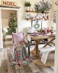 an instagram photo of a dining room decorated for christmas