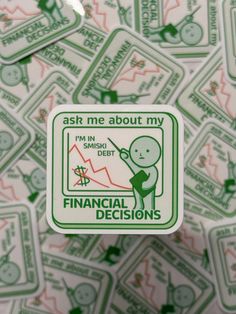 the sticker is on top of some green and white papers that say ask me about my financial decision