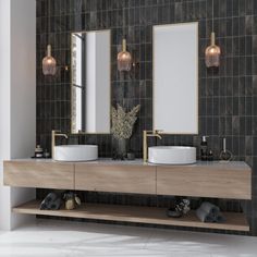 a bathroom with two sinks and mirrors on the wall next to each other in front of a tiled wall