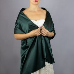 A very elegant satin shawl for your wedding party or evening dress. Made of luxury heavy satin, slightly sparkles on the sun or light. Color: green / emerald green ( other colors are available ) Size : 170 cm x 40 cm You can use it as a wrap, shawl or stola. WE have matching satin bags in Etsy Shop! WE accept credit cards! Green Silk Shawl For Wedding, Green Silk Scarf For Party, Elegant Silk Scarf With Satin Finish For Weddings, Evening Silk Scarf With Satin Finish, Elegant Green Shawl For Party, Elegant Green Shawl For Wedding, Elegant Green Silk Shawl Scarf, Elegant Green Silk Shawl, Elegant Green Wedding Shawl